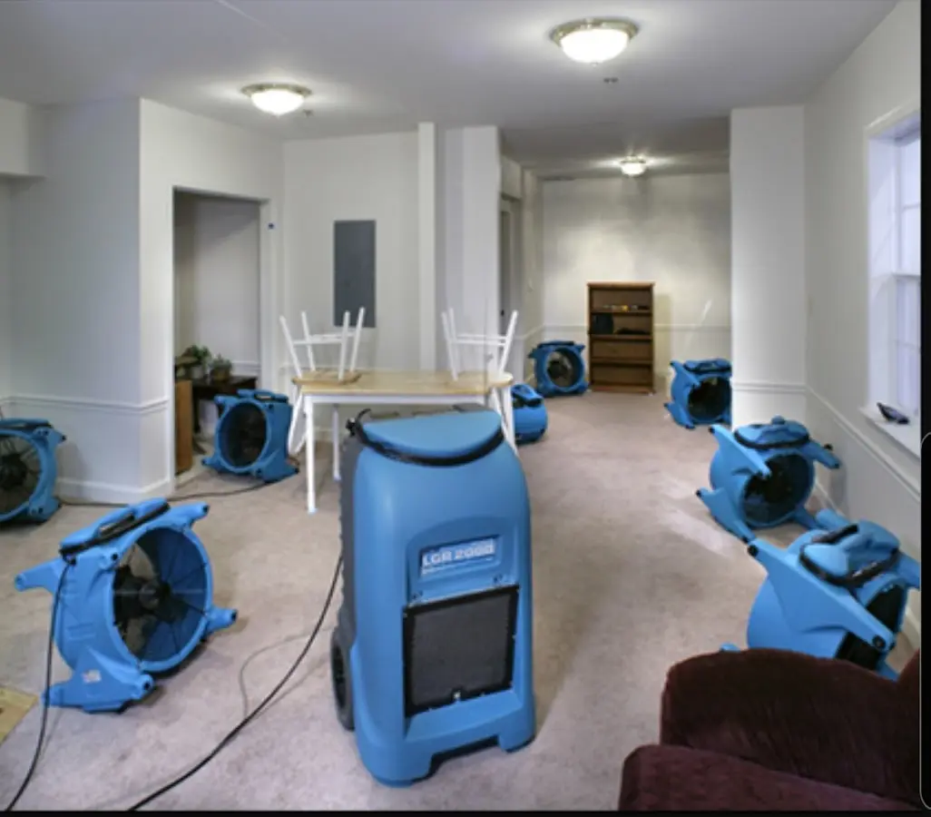 Air movers and dehumidifier setup for Water Damage Restoration in Northdale